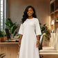 White Dress with AKA Shield