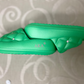 AKA | Green AKA slide