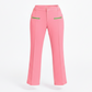 Pink pants with green accents on a white background